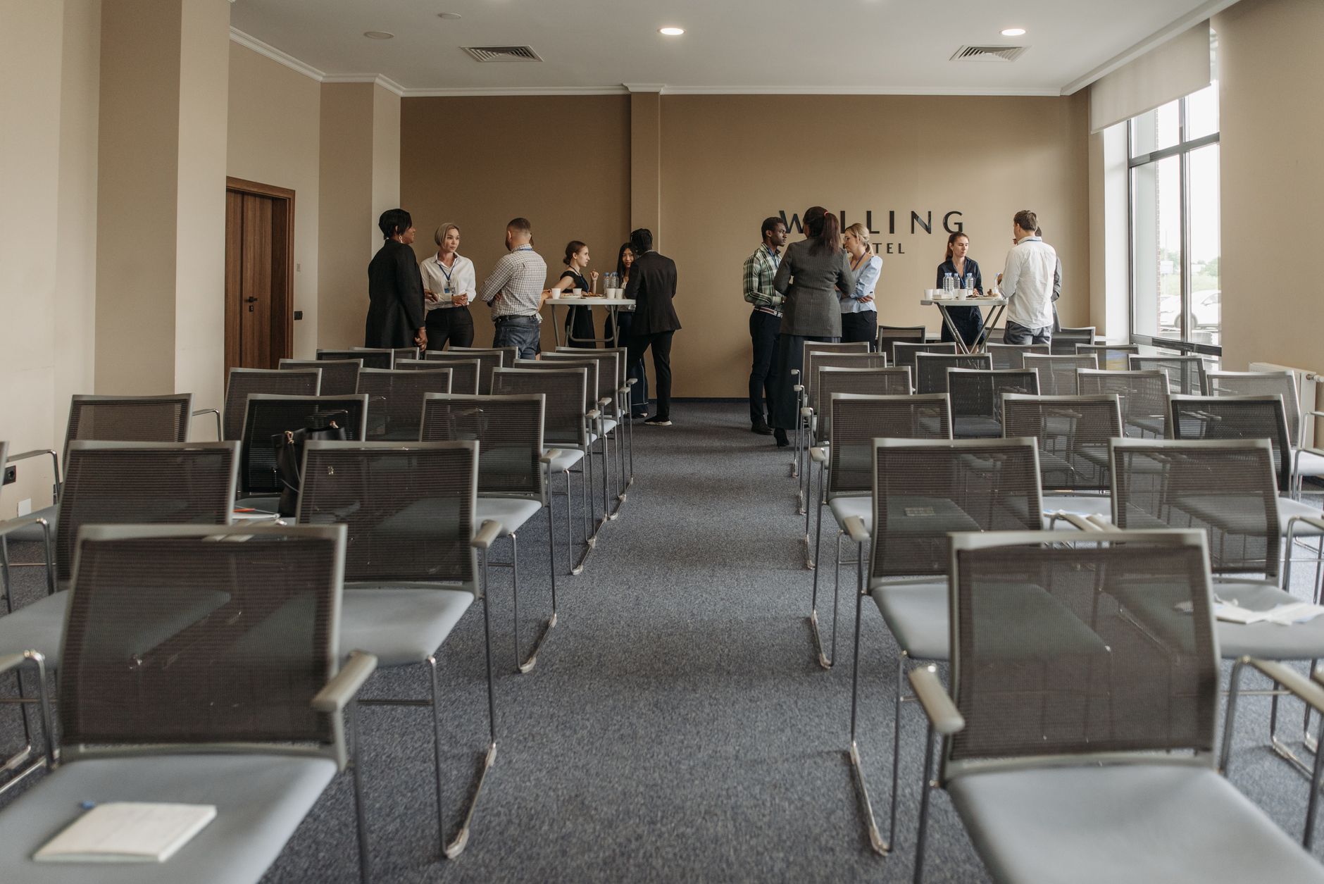 Corporate executives reviewing media intelligence statistics