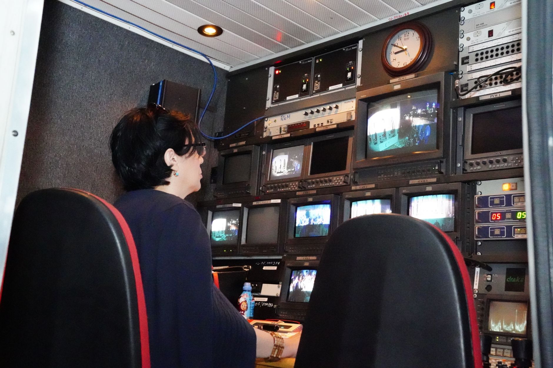 Modern control desk monitoring screens