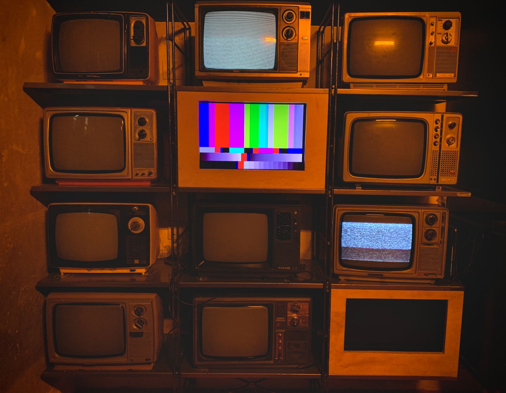 TV screens displaying live broadcasts